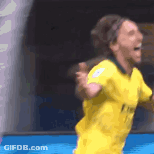Person In Yellow Jersey Saying Fly Emirates GIF