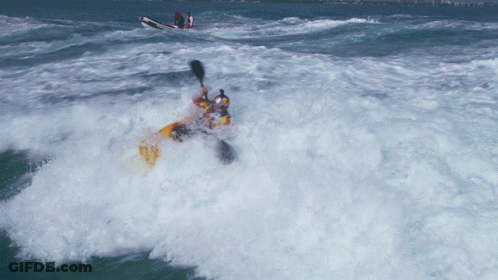 Person In Yellow Kayak Thrown Into Water GIF