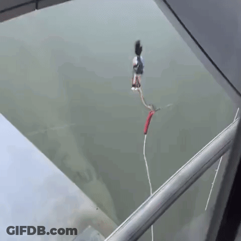 Person Jumping Off Balcony Into Water GIF