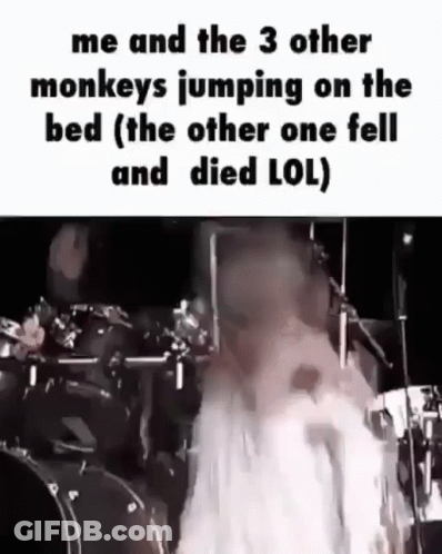 Person Jumping On Bed With Drum Set GIF