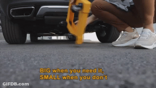 Person Kneeling Under Car Saying Big When You Need It Small When You Don't GIF