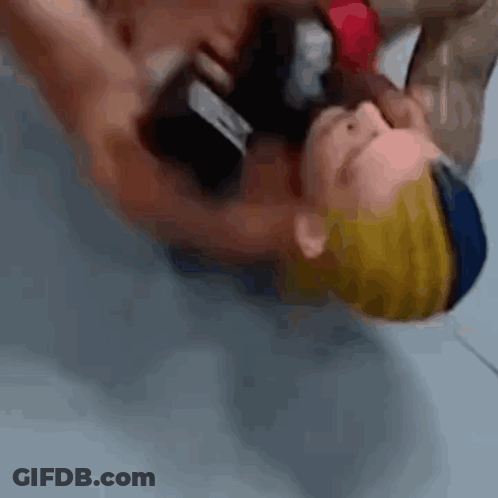 Person Laying Head On Another's Chest GIF