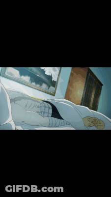 Person Laying In Bed With Picture On Wall GIF