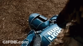 Person Laying In Blue Armor With Bud Light GIF
