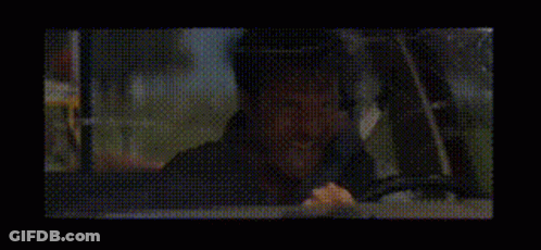 Person Laying On Bed In Dark GIF