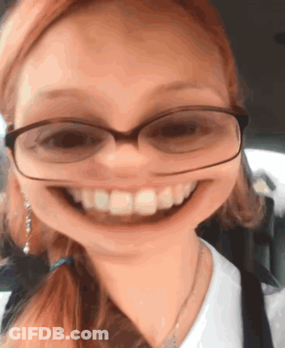Person Laying On Bed Phone Plugged In Ear GIF