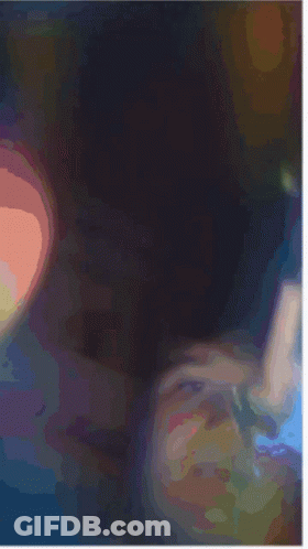 Person Laying On Bed Under Light GIF