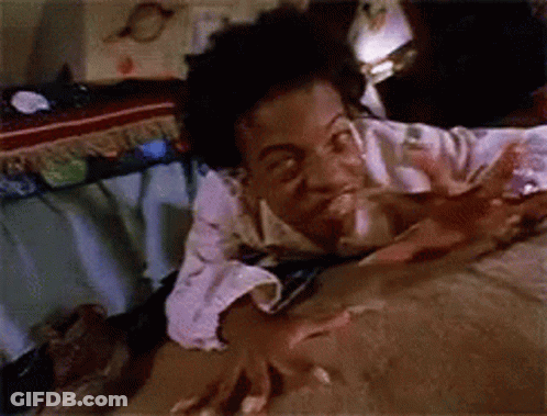 Person Laying On Bed With Hands On Blanket GIF