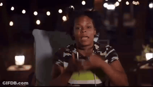 Person Laying On Bed With Pillow At Night GIF