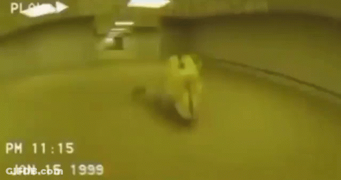 Person Laying On Floor In Yellow Room GIF