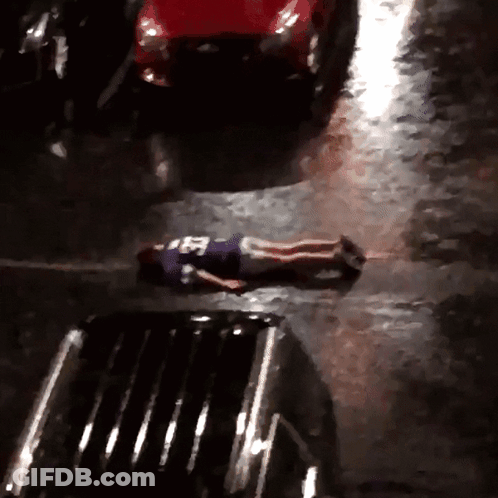 Person Laying On Ground In Purple Jersey Number 25 GIF