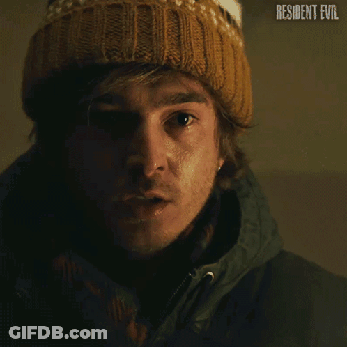 Person Laying On Ground With Gun On Knee GIF