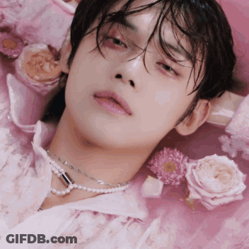 Person Laying On Pink Surface GIF