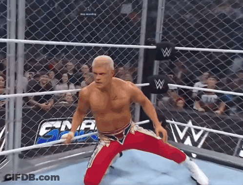 Person Laying On Wooden Floor Arms Outstretched GIF