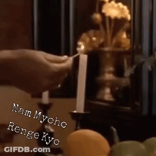 Person Lighting Candle In Dark Room GIF