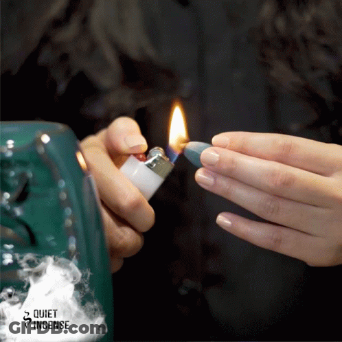Person Lighting Candle With Quiet Incense Logo GIF