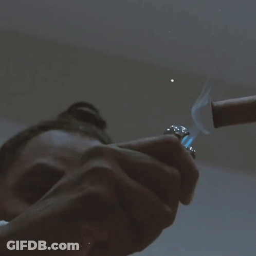 Person Lighting Cigar GIF