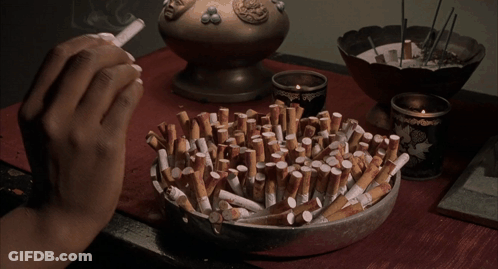 Person Lighting Cigarette GIF
