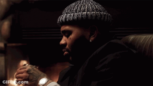 Person Lighting Cigarette With Clipper Lighter GIF