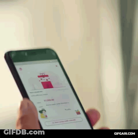 Person Looking At Gift Box On Phone GIF