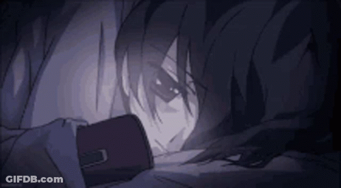 Person Lying Down Holding Flashlight In Dark Room GIF