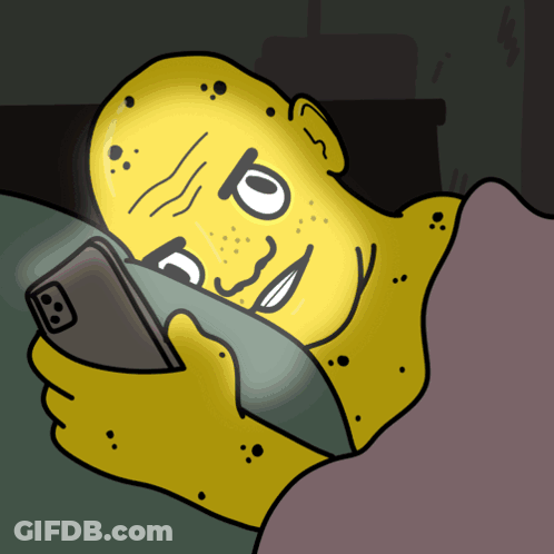 Person Lying In Bed Holding Phone GIF