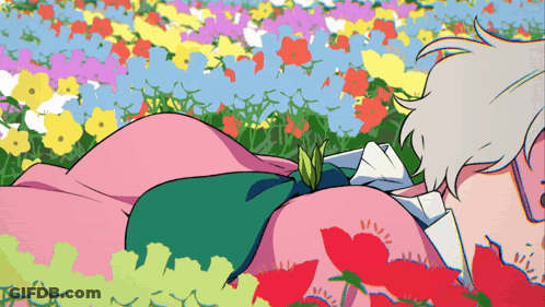 Person Lying In Flower Field With Plant Growing GIF