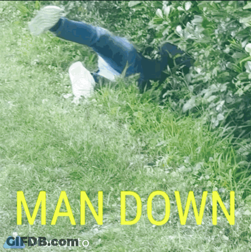 Person Lying In Grass Saying Man Down GIF