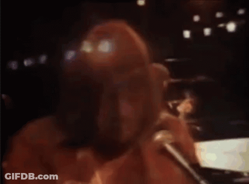 Person Lying On Bed In Dark Room GIF