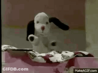 Person Lying On Bed With Blanket And Book GIF
