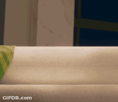 Person Lying On Bed With Green Blanket GIF