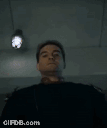 Person Lying On Bed With Light On Head GIF