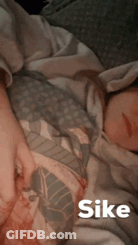 Person Lying On Bed With Sike GIF