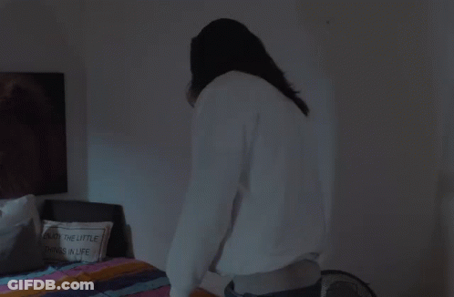 Person Lying On Bed With Wonderful Little Pillow GIF