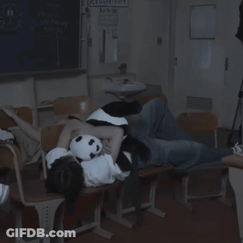 Person Lying On Chair With Panda Stuffed Animal GIF