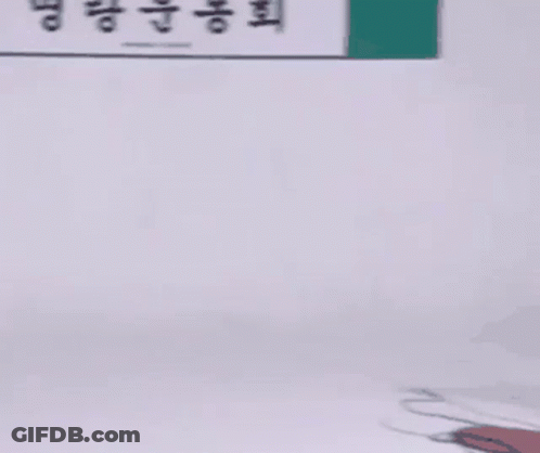 Person Lying On Floor With Boxing Glove On Knee GIF