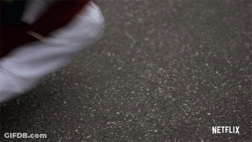Person Lying On Ground With Netflix GIF