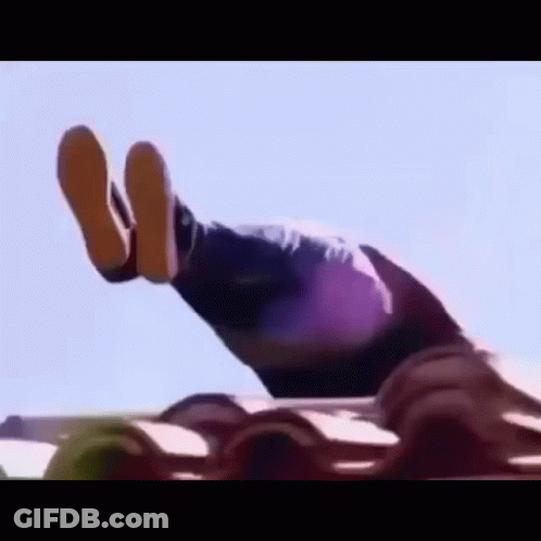 Person Lying On Roof With Feet Up GIF