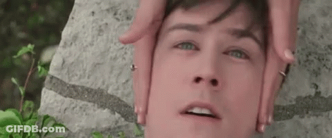 Person Making Face With Hands GIF