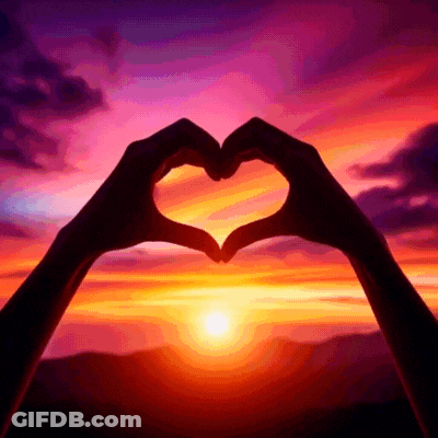 Person Making Heart Hands GIF