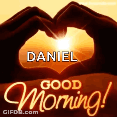 Person Making Heart Shape In Front Of Sunset GIF
