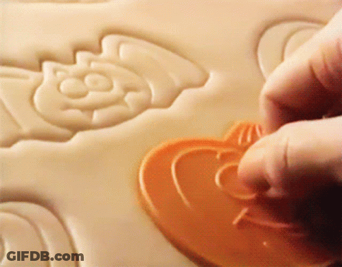 Person Making Heart With Cookie Cutter GIF