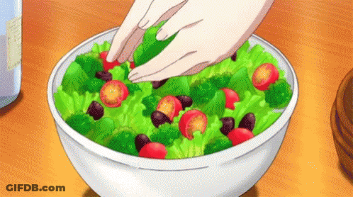 Person Making Salad With Vegetables GIF