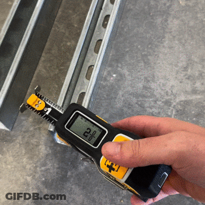 Person Measuring Metal With Tape Measure 2.0 Inches GIF