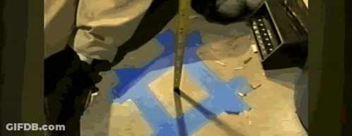 Person Measuring With Tape Measure GIF