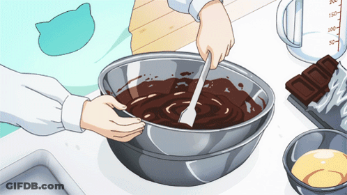 Person Mixing Chocolate In Metal Bowl GIF