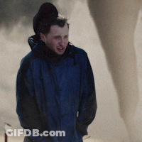 Person On Black And Yellow Striped Background GIF