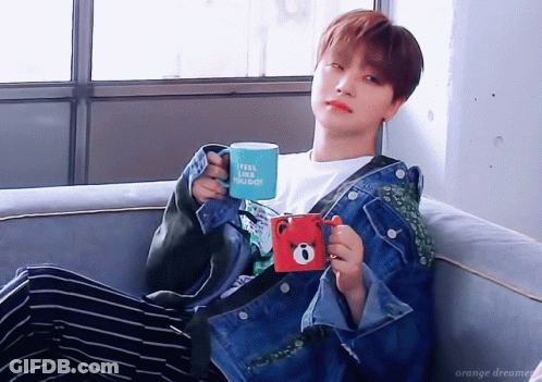 Person On Couch Holding Feel Like You Do Mug GIF