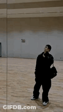 Person On Fire Standing On Wooden Floor GIF