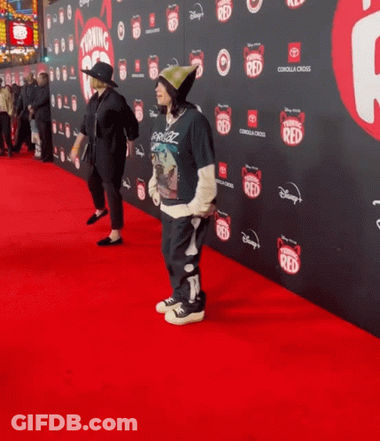 Person On Red Carpet With Disney Logo GIF